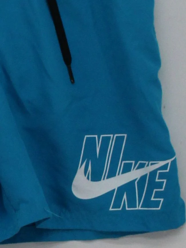 Nike athletic swim trunks in blue - Image 4