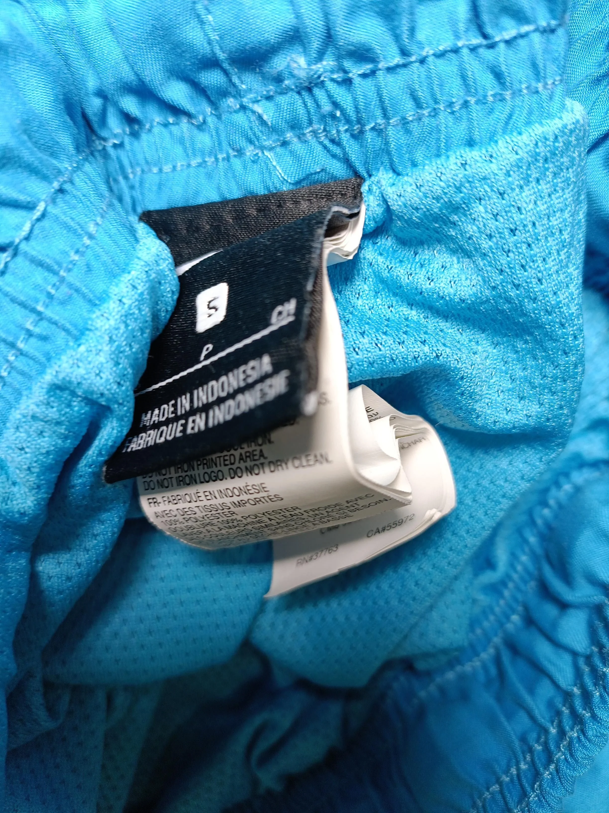 Nike athletic swim trunks in blue - Image 6